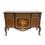 A pair of French commodes of Louis XVI design, of breakfront form with strung and marquetry inlay,