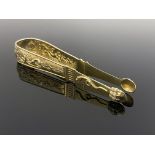 A pair of Continental silver gilt sugar tongs