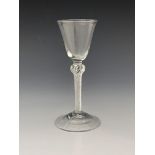 A composite double knopped air twist wine glass