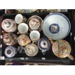 A collection of Chinese and Oriental ceramics, including teapots, six tea cups and saucers, vase and