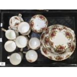 Royal Albert Old Country Roses part tea service, including six tea cups and saucers, platters,