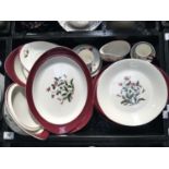 A Wedgwood Mayfield Ruby part dinner and tea service, including dinner plates, cups and saucers,