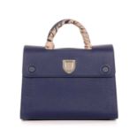 Christian Dior, a Diorever handbag with Twilly scarf, crafted from grained blue leather, featuring a