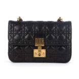 Christian Dior, a Dioraddict Cannage handbag, deigned with the maker's classic quilted black leather