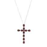 An 18ct gold pear-shape garnet cross pendant, suspended from an 18ct gold trace-link chain, total