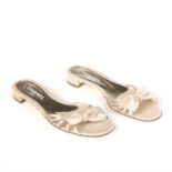 Chanel, a pair of unworn Grosgrain Bow sandals, crafted from beige satin grosgrain, with bow