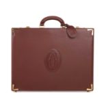 Cartier, a Must De Cartier Bordeaux leather briefcase, designed with a smooth burgundy leather