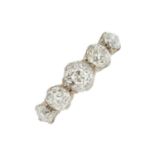 An early 20th century graduated old-cut diamond five-stone ring, with slightly tapered shoulders,