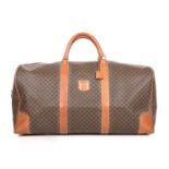 Celine, a vintage holdall travel bag, crafted from macadam coated canvas with tan leather trim,