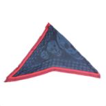 Alexander McQueen, a wool triangle Skull scarf, the blue and red scarf, featuring black skull