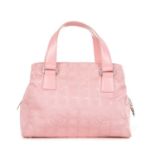 Chanel, a Travel Line handbag, designed with a pink logo patterned canvas exterior, with pink