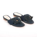 Chanel, a pair of Camellia thong sandals, crafted from blue denim, featuring a large camellia flower