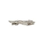 An early 20th century pave-set diamond fox brooch, with ruby cabochon eye, estimated total old-cut