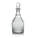 A George III cut glass cylinder decanter, circa 1790, facet cut three ring neck with fluted base,