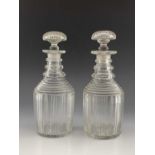 A pair of cut glass cylinder decanters