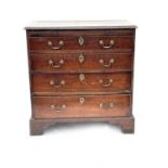 A George III mahogany chest of drawers, circa 1770, crossbanded moulded edge top, brushing slide