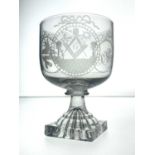 A George III masonic engraved rummer, circa 1810, the rounded bowl engraved with three roundels of