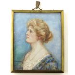 J Crawford (British early 20th century), portrait miniature of an Edwardian woman, wearing a