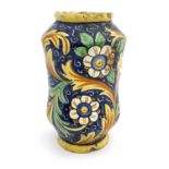 An Italian Maiolica albarello pharmacy jar, probably 17th century, waisted shouldered form,