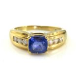 18ct gold tanzanite and diamond ring, size M 1/2