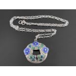 Murrle Bennett and Co., an Arts and Crafts silver and enamelled pendant,