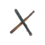 A Victorian turned treen truncheon, painted blue with V.R monogram to the tip in gilt, 40cm long,