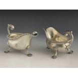 A pair of Edwardian silver sauce boats, Goldsmiths and Silversmiths Company, London 1908, helmet