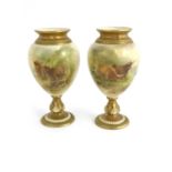 Harry Stinton for Royal Worcester, a pair of handpainted highland cattle vases, circa 1919, ovoid