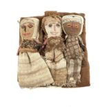 A Peruvian Chancay triple group of textile burial dolls, each as children with expressive faces