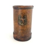 A Victorian leather Cordite bucket, cylindrical form, transfer printed with the Royal coat of