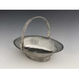 A George III Neoclassical silver bread or cake basket, of oval form with swing handle, reticulated