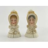 Two Royal Worcester candles snuffers, the Old Woman and Young Woman, highlighted in gilt, green