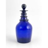 A Bristol blue glass three ring neck decanter