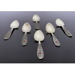 A set of six Soviet Russian silver gilt and cloisonne enamelled teaspoons