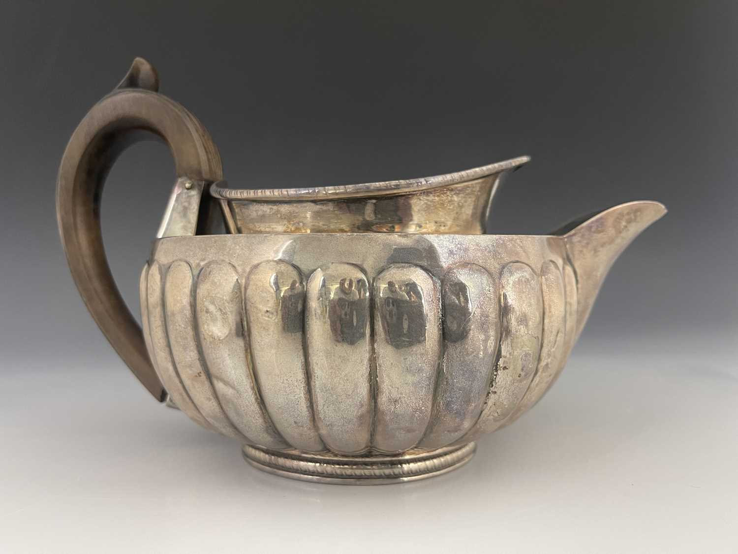 A George III silver teapot, Peter, Ann and William Bateman, London 1802, hemispherical shouldered - Image 2 of 7