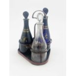 Three George III glass spirit decanters,