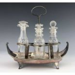 A George III Old Sheffield Plate and cut glass four bottle cruet stand