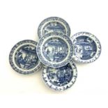 Five Chinese blue and white soup plates, 19th century, painted with conversational figures in garden