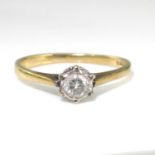 An 18 carat gold and diamond solitaire ring, size K 1/2