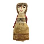 A Peruvian Chancay textile burial doll, girl with long hair and an expressive face, 15cm high