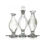 Three George III glass condiment bottles