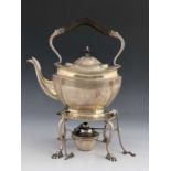 An Edwardian silver kettle on stand, E Baker, Birmingham 1905, ogee section boat form with reeded