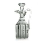 A cut glass claret jug and stopper