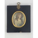 An early 20th century portrait miniature of an 18th century woman, wearing pearls and a blue sash,