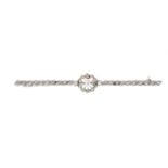 An Edwardian old and rose-cut diamond openwork bar brooch, with rose-cut diamond line sides,
