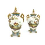 C Harris For Royal Crown Derby, a pair of fancy bird painted vases and covers, flattened ovoid
