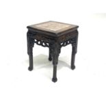 A Chinese hardwood low table, early 20th Century, square section with inset pink marble top,