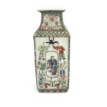A Chinese famille verte relief moulded vase, shouldered square section, each side with panels of