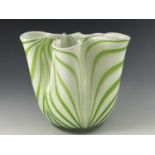 A Murano type glass handkerchief vase, late 20th century, cased green stripes over white opaque,