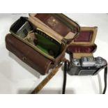 A Zeiss Ikon camera in pig skin leather case by Wallis Heaton Ltd